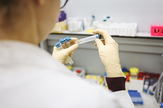 person-holding-test-tubes-3735747-pexel-550.jpg